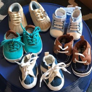 5 pairs of baby boy shoes. One with tags.